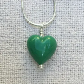 Necklace with dark green pastel Murano glass small heart pendant on silver snake chain