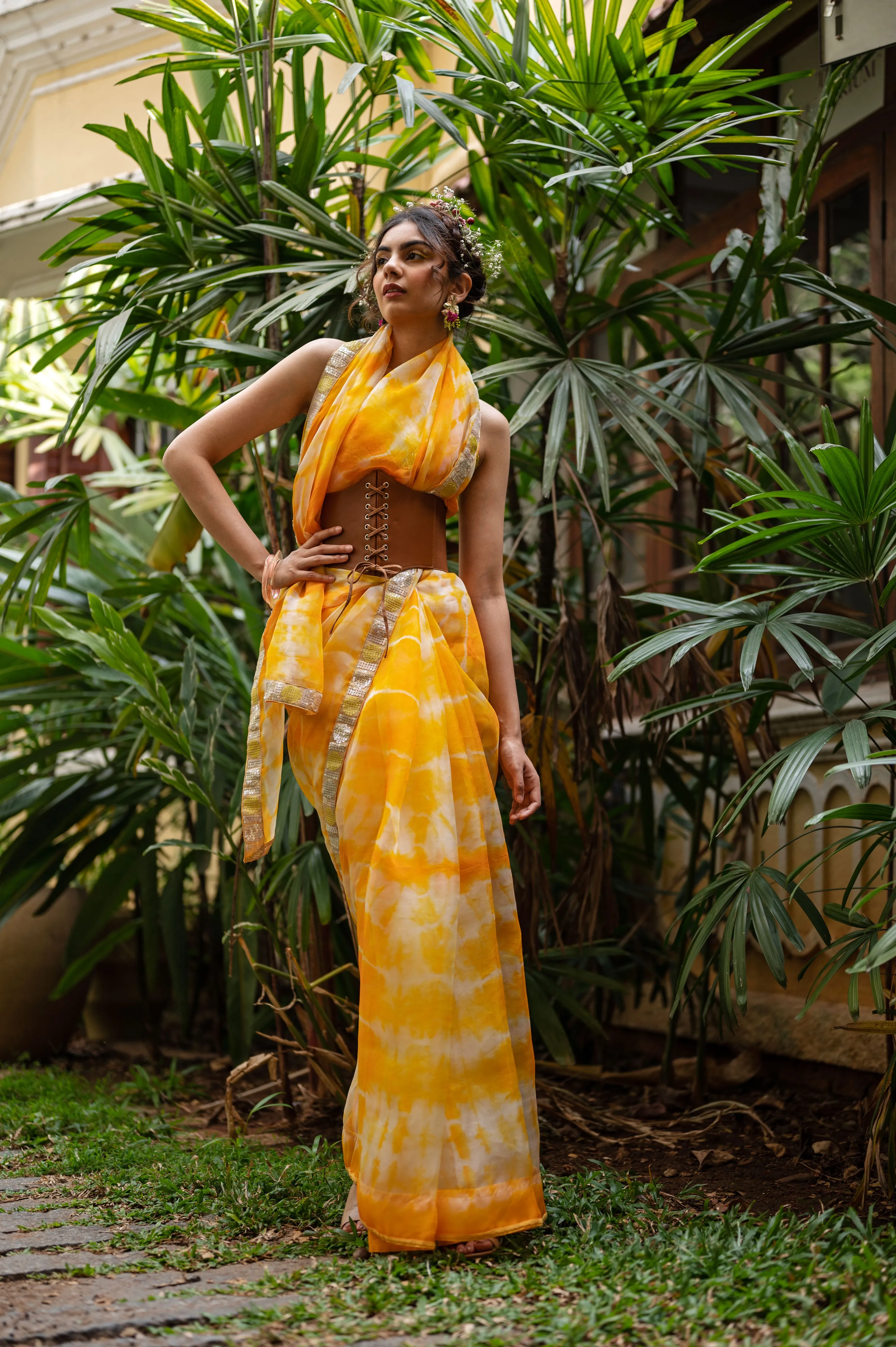 Organza tie and dye saree with hand embroidered polka sequence border