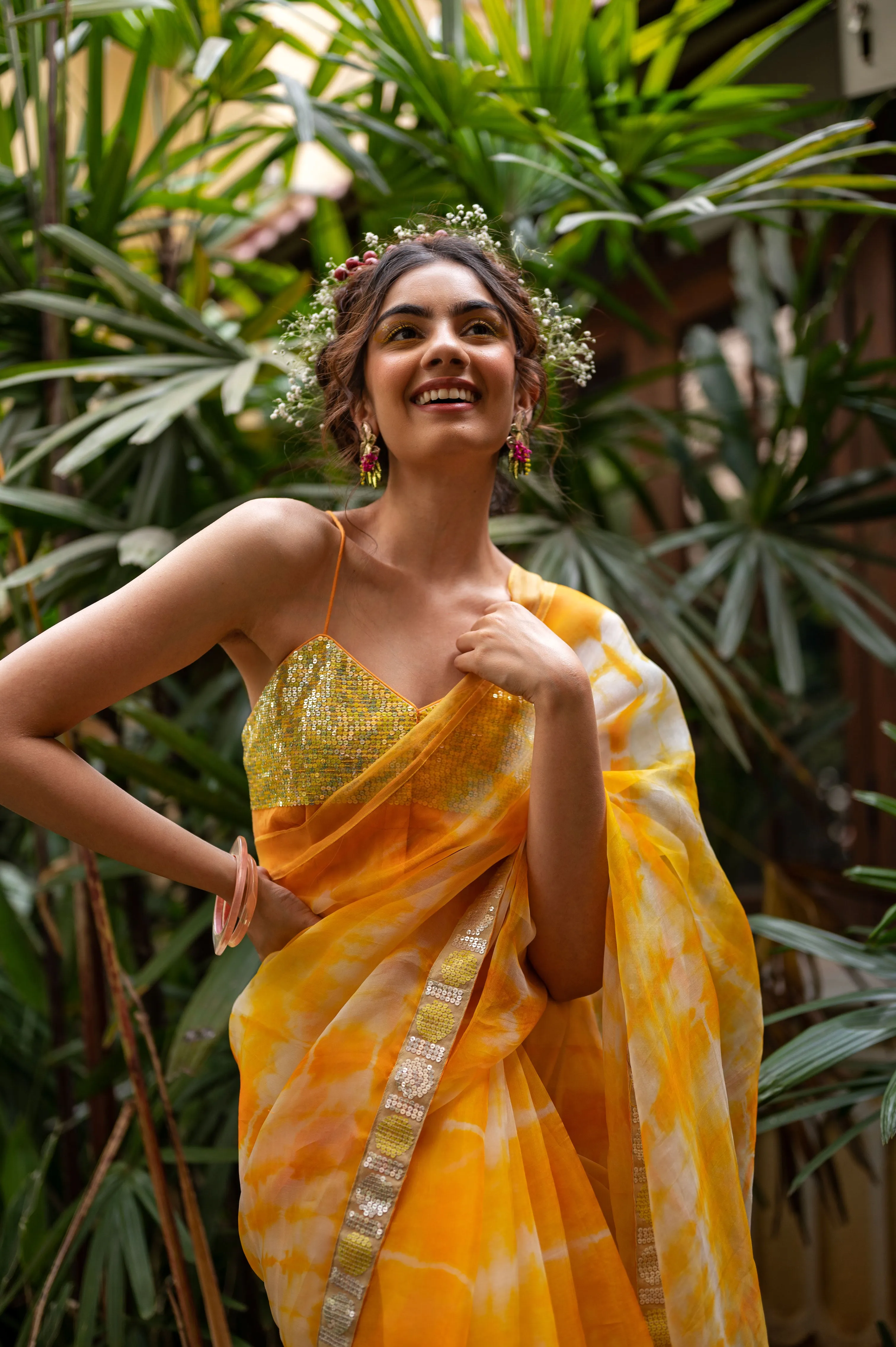 Organza tie and dye saree with hand embroidered polka sequence border